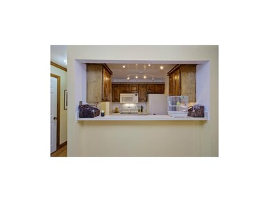 Pass-through offers bar height seating.