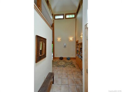 THIS SPACIOUS CENTRAL ATRIUM, WITH VAULTED WINDOWS
