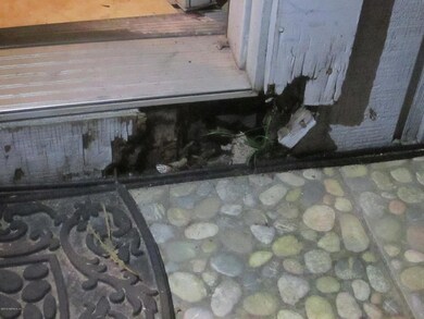 wood rot on main entrance