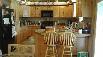 kitchen opens to dining