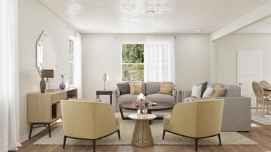 Living room with wood-type flooring
