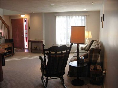 Living Room. Oversized windows make this spacious