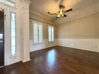 Formal dinning room - Versatile space with high ceilings, shutters, and dimmable lighting