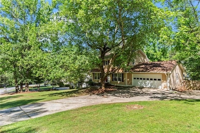 Spacious lot and extended paved parking.
