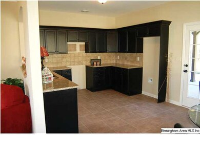 This home has a great pass through kitchen.  The c