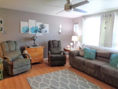 living room with led fan-light,  laminate floors