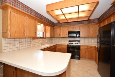 Lots of cabinets and snack bar