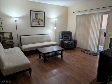 Living area with wood finished floors