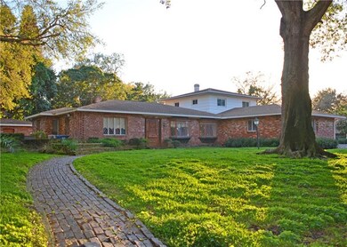 Located on 1.3 acres (mol), front, back, and side 