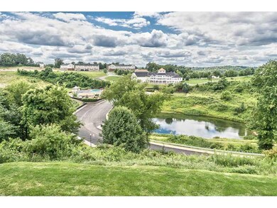 View. VIEW OF THE POOL AND CLUBHOUSE FROM THE DECK