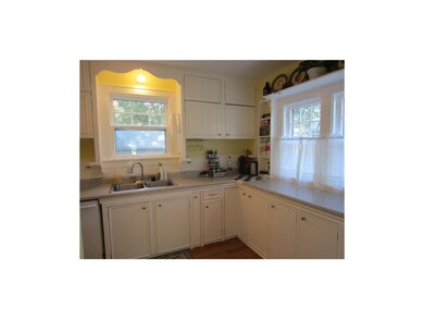 Kitchen with newer countertops and dishwasher