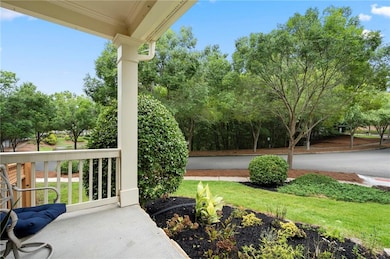 View of patio with view of wooded area