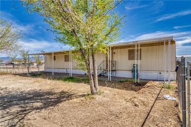 View of front of house featuring fence