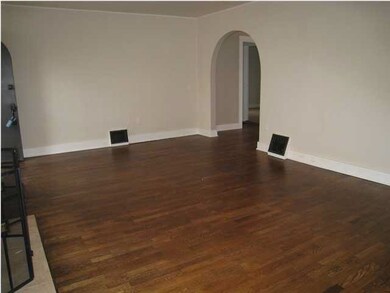 Another view of the good sized living area and bea