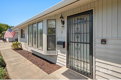 Entrance to property featuring board and batten siding