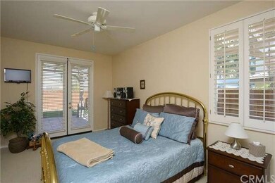 Downstairs Bedroom 1 with double door access to ba