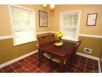 Dining room with ceramic tile floor.