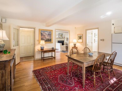 An informal vestibule entrance leads...