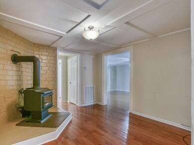DINING ROOM WITH WOOD STOVE