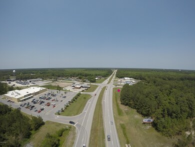 4.12 Acres Commercial HW 70& Roberts Rd.