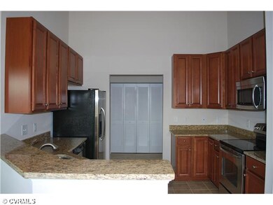 Kitchen - Granite countertops, tile floor
