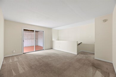 A large living area with a comfortable and invitin