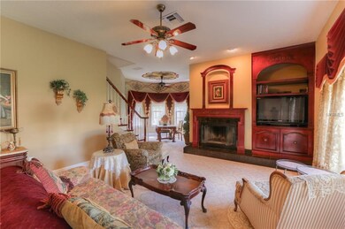 The open family room features a fireplace, custom 
