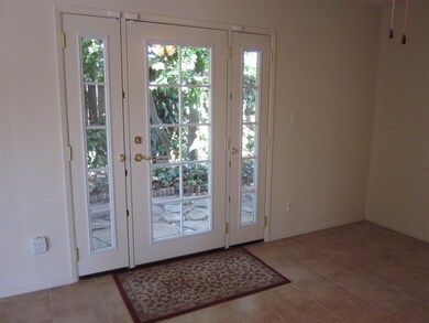 Formal Dining room with French Doors out to yard.