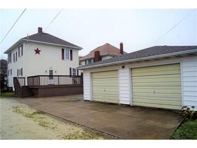 OUT BACK YOU WILL FIND A 2 CAR DET. GARAGE AND A L
