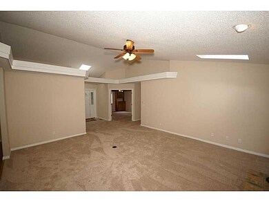 Living Room. looking toward den and entry