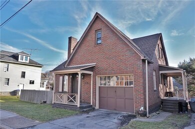 Front and side porches, 1 stall integral garage an