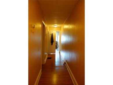 Exterior Front. 1st floor unit hallway