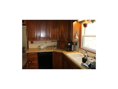 Wrap Around Kitchen With View To Backyard, Lots of