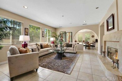 Family Room with Italian Porcelain Flooring Lookin