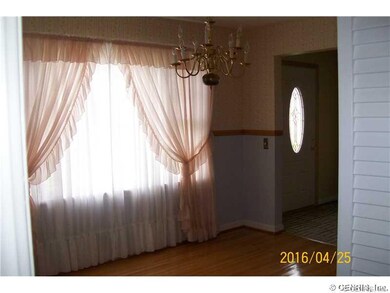 Dining Room. Formal dining room/hardwood floors.