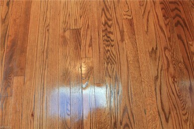 freshly refinished natural hardwood floors through