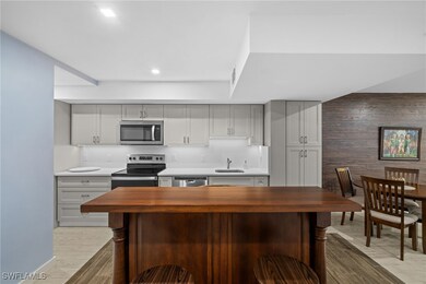 Kitchen with appliances with stainless steel finis