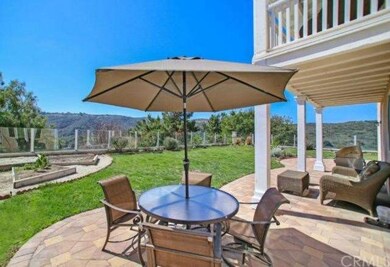 Back and side yard offer glass walls for unobstruc