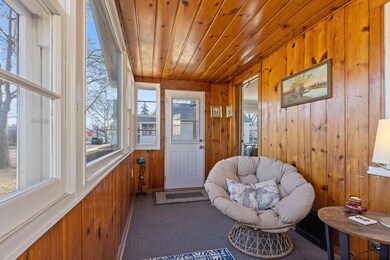 Enclosed front porch.