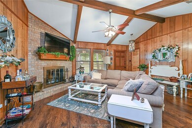 Living room, entry door, wood burning fire place