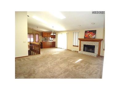 View of dining area and kitchen.