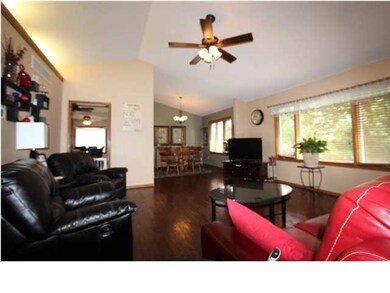 Living room with hand scraped hard wood flooring