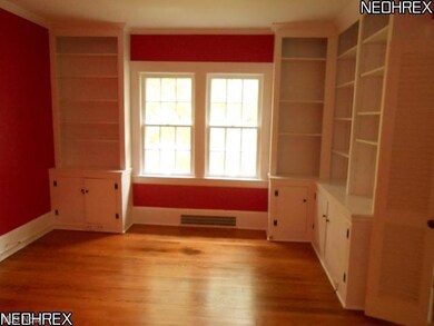 Cozy Library with built in bookcases