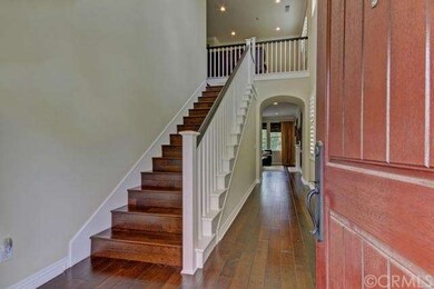 Gorgeous wood floors extend throughout this stunni
