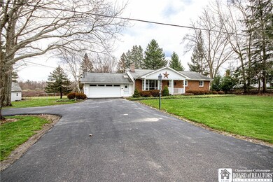Nice wide driveway with additional parking to the