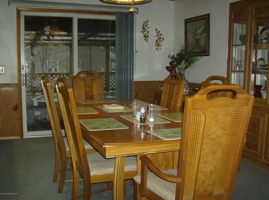 Dining area with slider to screened porc