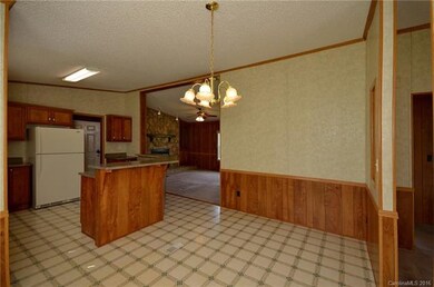 Dining open to kitchen for easy entertaining