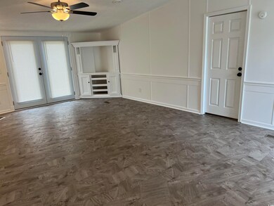 Interior space featuring ceiling fan