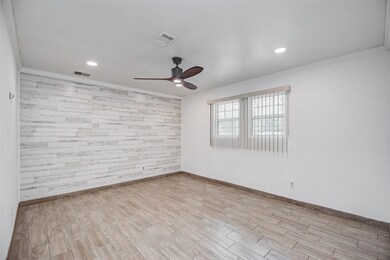 9203 Bisley Ln, Houston, TX 77088 - photo 5