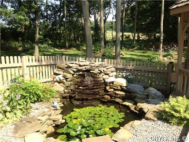 Patio/Deck. Coi pond and waterfall....beautiful an